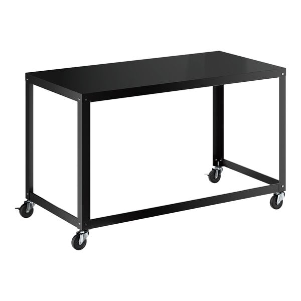 A black metal desk with a rectangular top and four caster wheels for mobility.