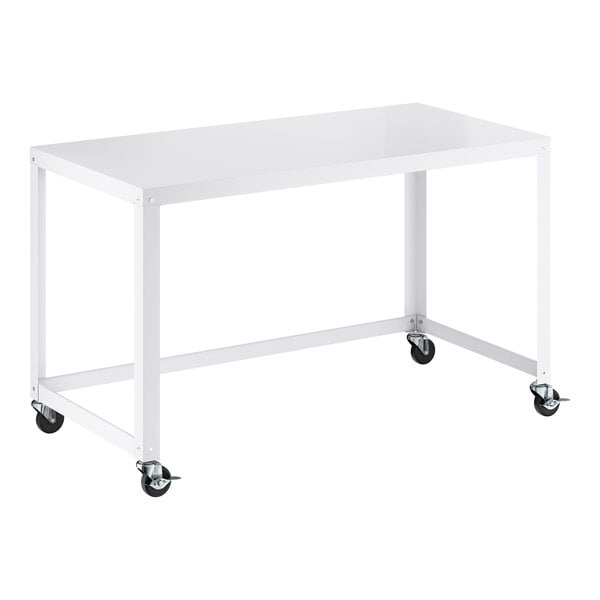 A white metal desk with a rectangular top and four caster wheels for mobility.