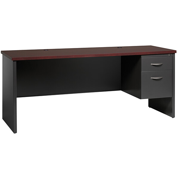 A charcoal desk credenza with mahogany drawers on the right.