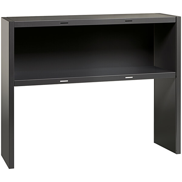 A black desk with a shelf on top.