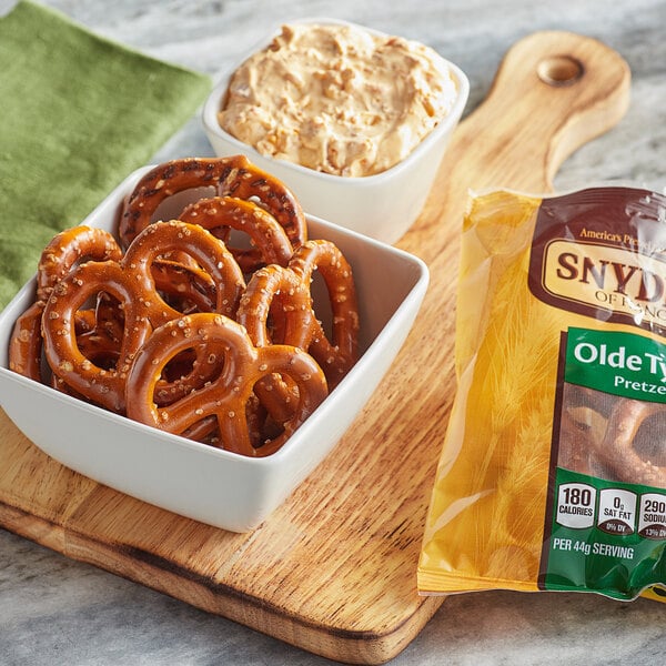 A bowl of Snyder's of Hanover pretzels with salt.