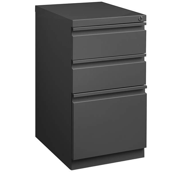 A medium tone black file cabinet with three drawers.