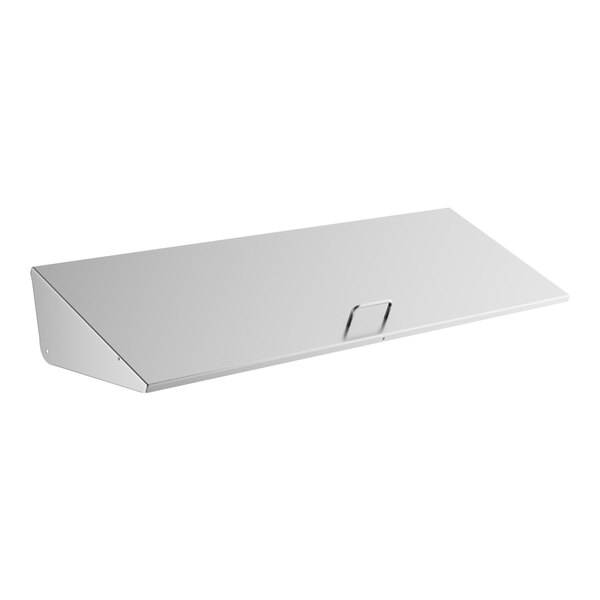 A white rectangular lid with a metal handle.