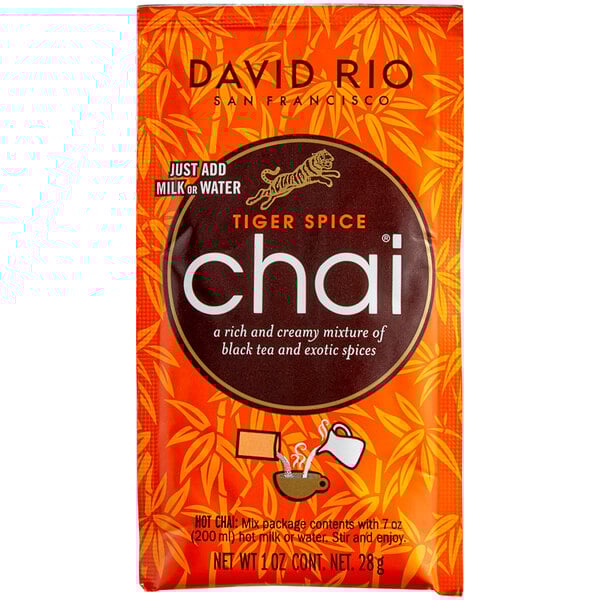 A box of 12 David Rio Tiger Spice Chai Tea Latte single serve packets with a tiger on the package.