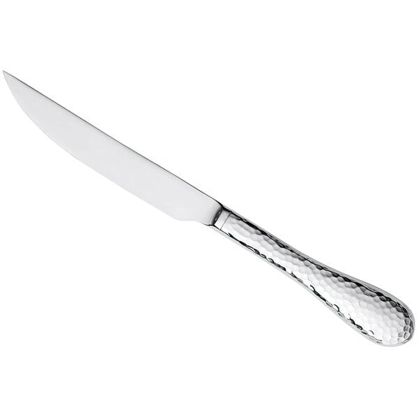 A Reserve by Libbey stainless steel steak knife with a textured hollow handle.