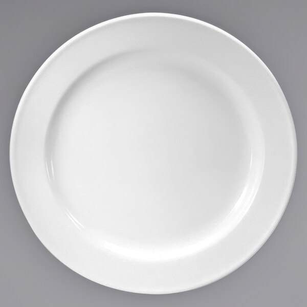 A cream white porcelain plate with a white rim.