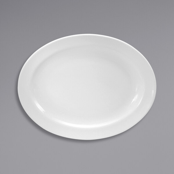 A close-up of a Oneida Shape 2000 cream white porcelain platter with a rim.