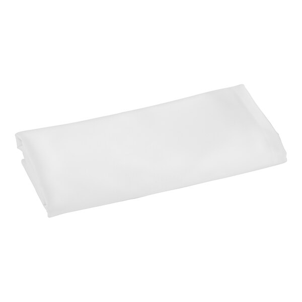 A white folded cloth table cover.