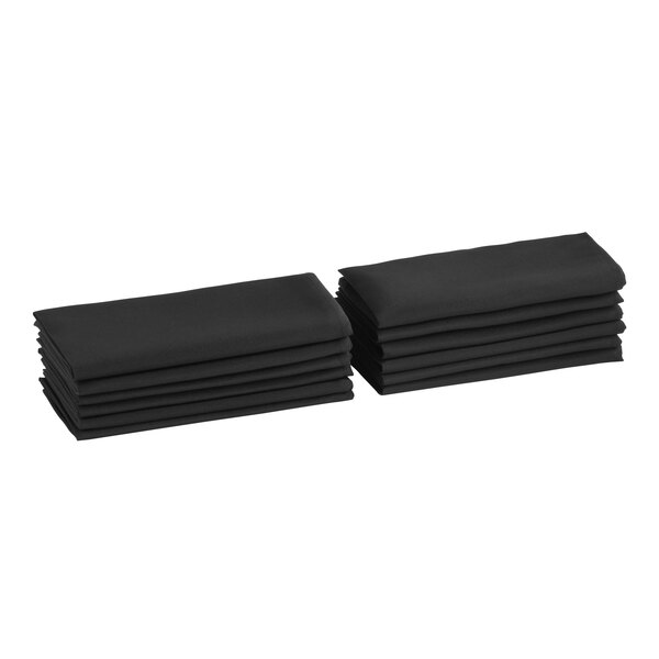 A stack of black cloth napkins.