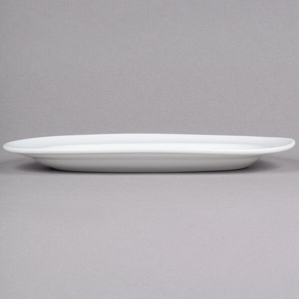 A white rectangular Arcoroc porcelain platter.