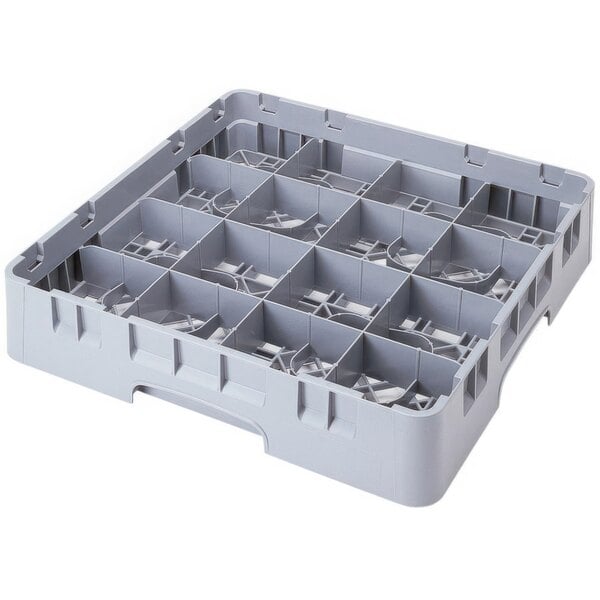 A grey plastic Cambro cup rack with 16 compartments.
