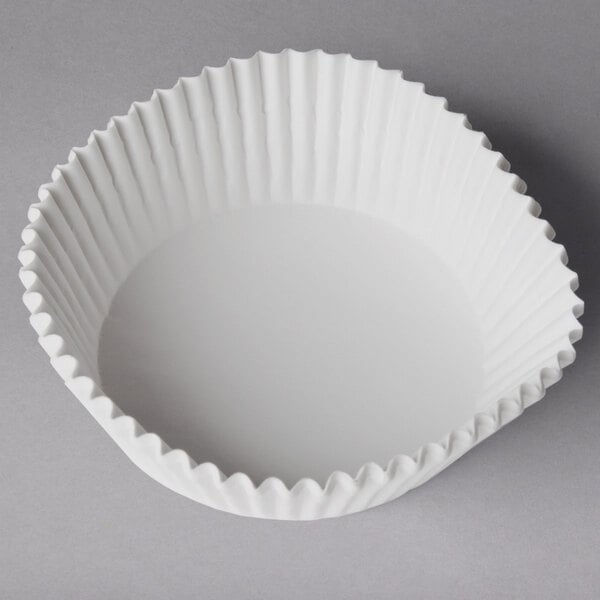 A white paper cupcake liner.