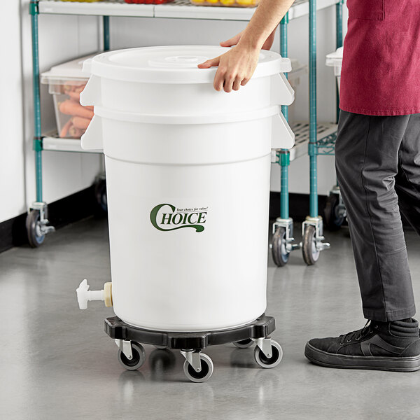 A person pushing a large white Choice vegetable crisper bin