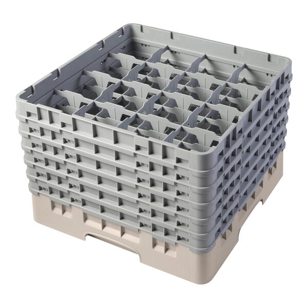 A beige plastic Cambro glass rack with 16 compartments.