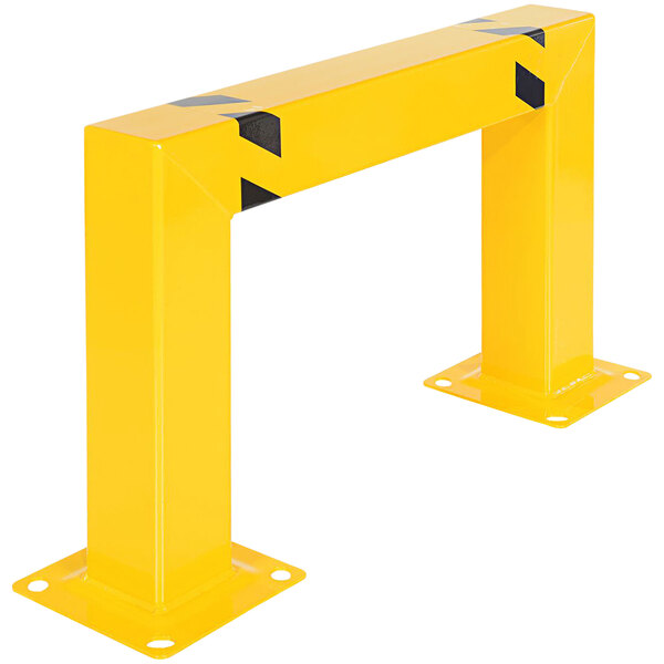 A yellow metal barrier with black stripes.