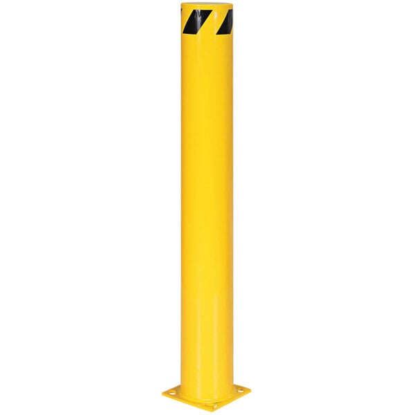 A yellow steel bollard with black stripes.