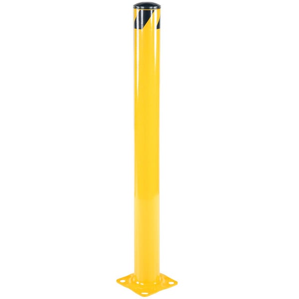 A yellow steel bollard with a black top.