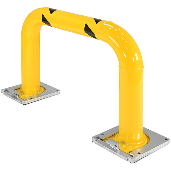 A yellow metal rack guard with black and yellow stripes on the base.