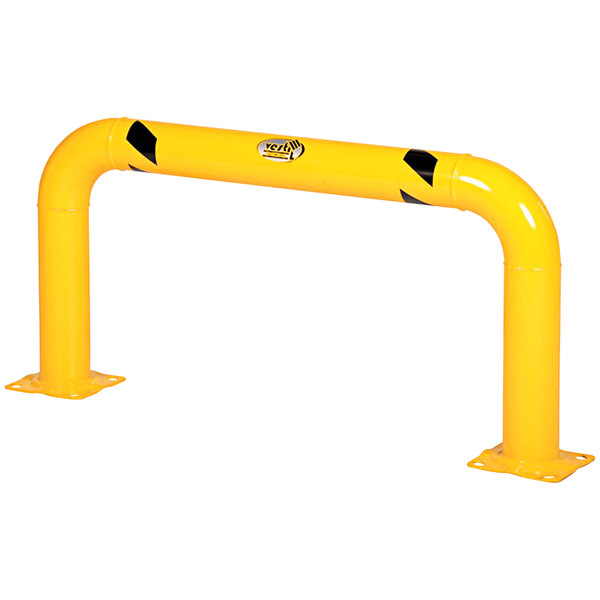 A yellow steel machinery guard with black markings on the top.