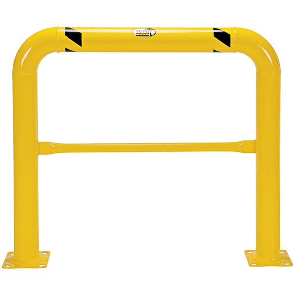 A yellow metal machinery and rack guard with black stripes.