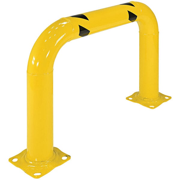 A yellow metal Vestil machinery guard with black markings and two black handles.