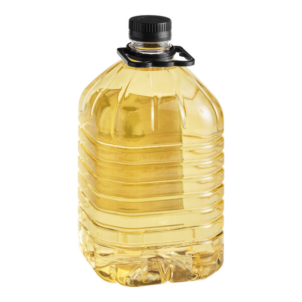 A large, clear plastic bottle filled with a light yellow liquid and sealed with a black screw cap.