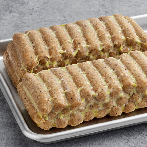 Field Roast plant-based apple maple breakfast sausage links on a tray.