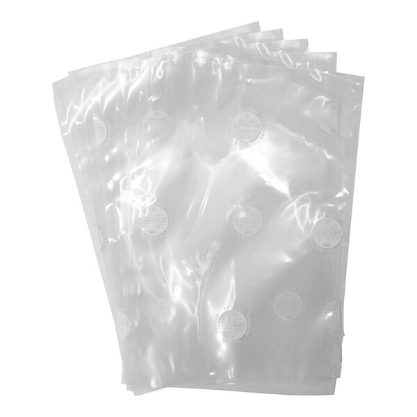 A stack of clear plastic Globe vacuum storage bags with a white circle and black text.