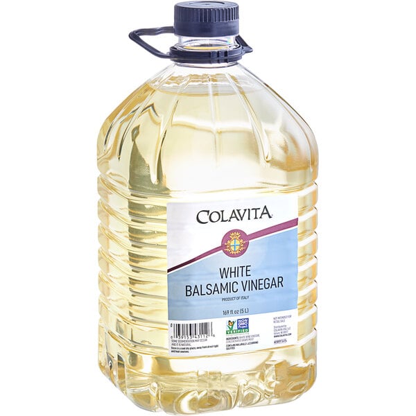 A bottle of Colavita White Balsamic Vinegar with a label and a black cap.
