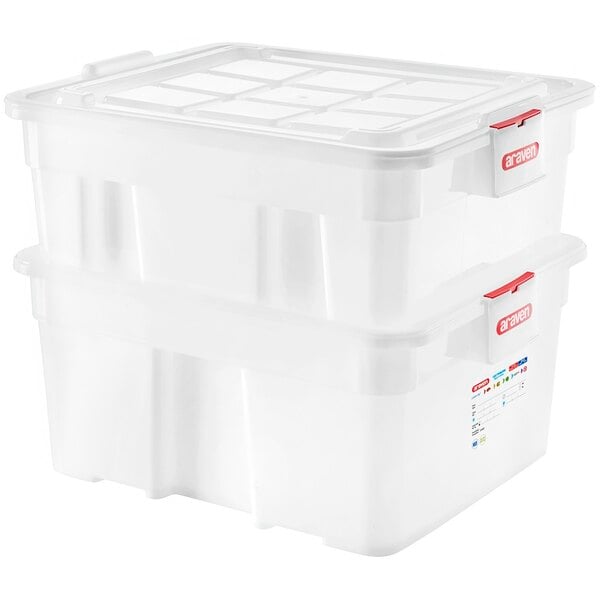 A stack of white Araven nested defrost and food storage boxes.