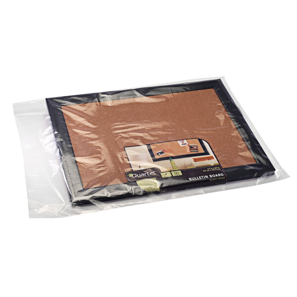 A Lavex clear flat poly bag on a cork board.