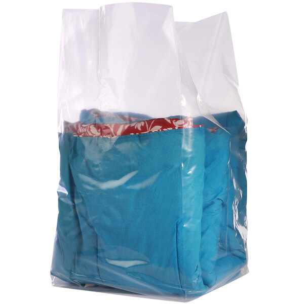 A close-up of a clear Lavex poly bag with blue and red clothing inside.