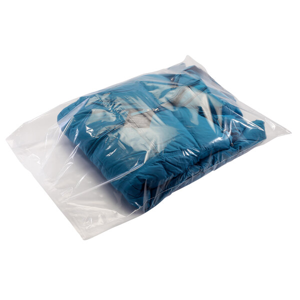 A Lavex clear plastic bag with blue clothes inside.