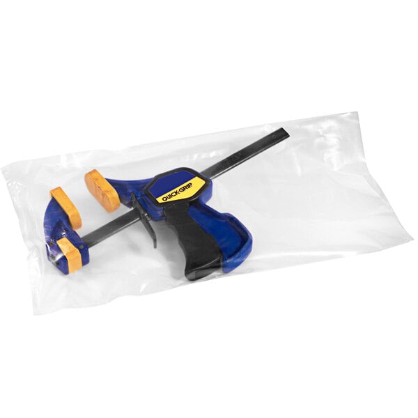 A Lavex clear plastic bag with a blue and yellow tool inside.