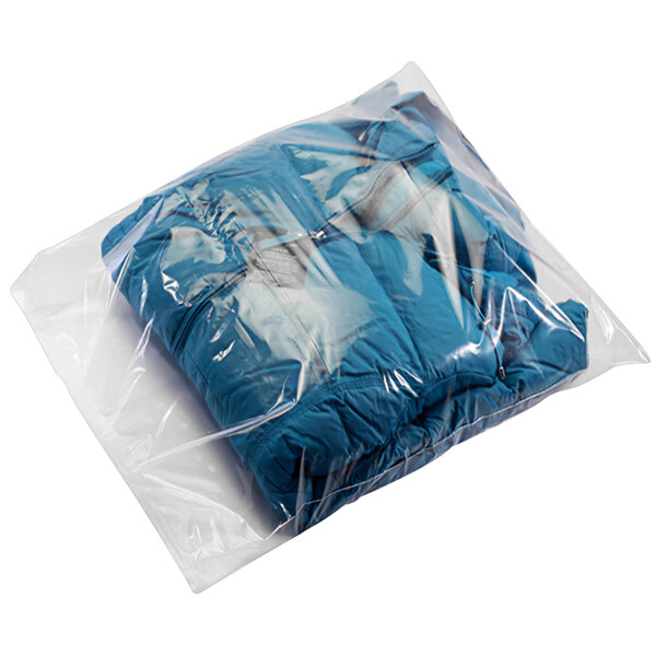 A Lavex clear plastic bag filled with blue clothes including a blue jacket.