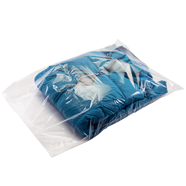 A Lavex clear poly bag filled with blue clothes including a blue jacket.