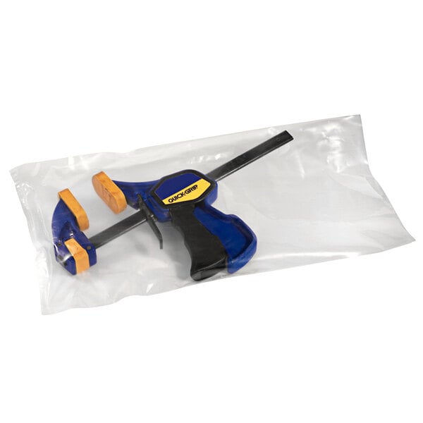 A blue and black tool in a clear plastic bag with a white label.