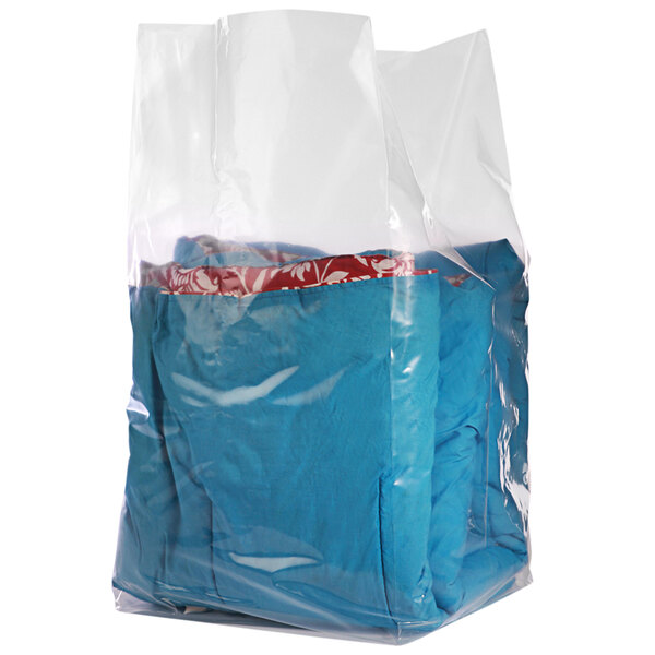 A Lavex clear gusseted poly bag with blue clothing inside.