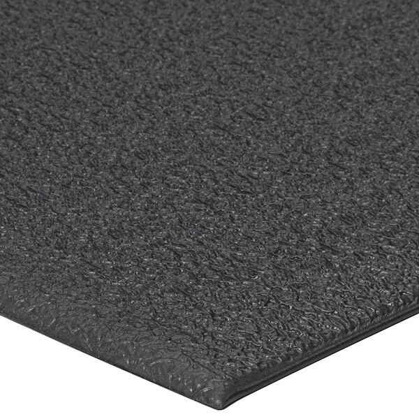 A close up of a black Lavex ArmorStep foam mat with a pebble emboss.