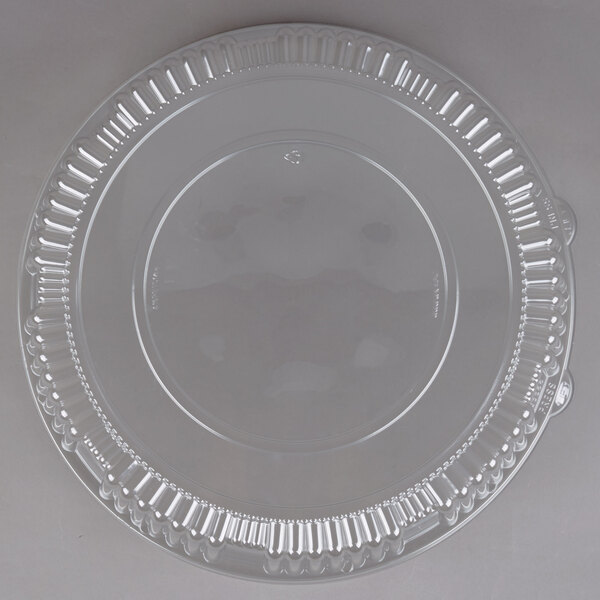 A clear plastic lid with a decorative edge designed for WNA Comet CaterLine Casuals 16" trays.