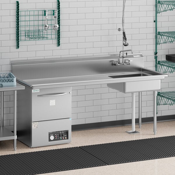 A Regency stainless steel dishtable with a right drainboard, sink, and dishwasher.