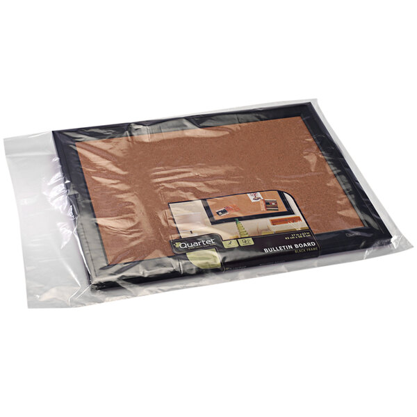 A Lavex clear plastic bag containing a cork board.