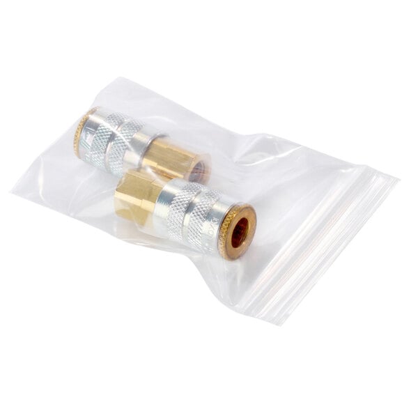 A couple of metal connectors in a clear plastic bag with a white background.