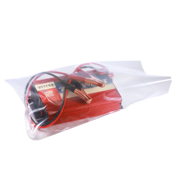A Lavex clear flat poly bag holding a battery charger with red and black cables.