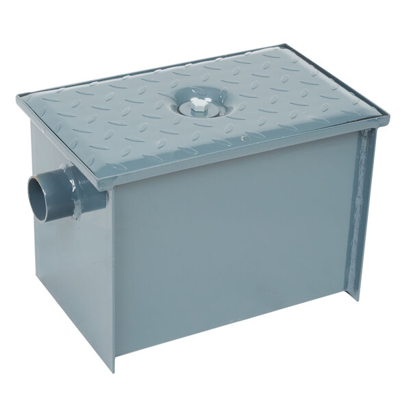 A grey metal Watts WD-4 Grease Trap.
