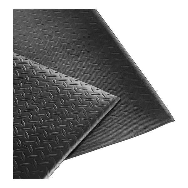 A black anti-fatigue mat with a diamond plate texture.