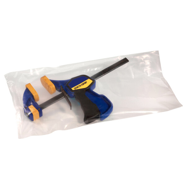 A clear plastic bag with a blue and yellow tool.