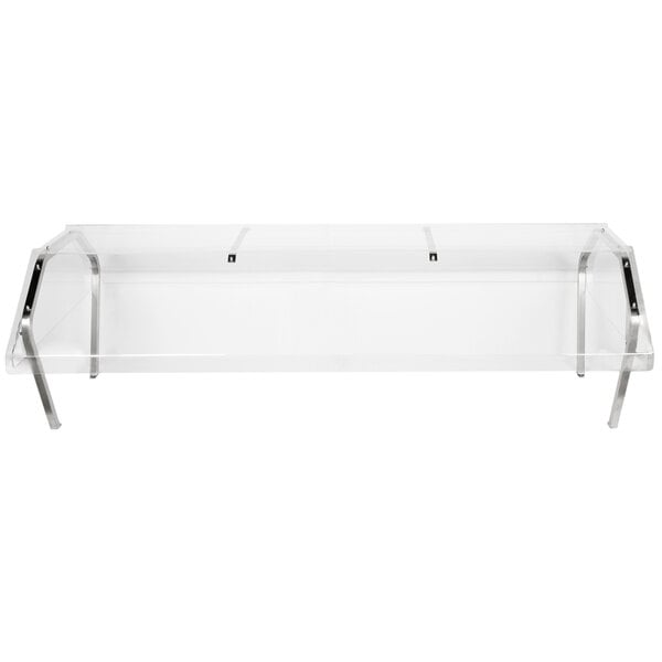 A clear plastic shelf with silver legs.