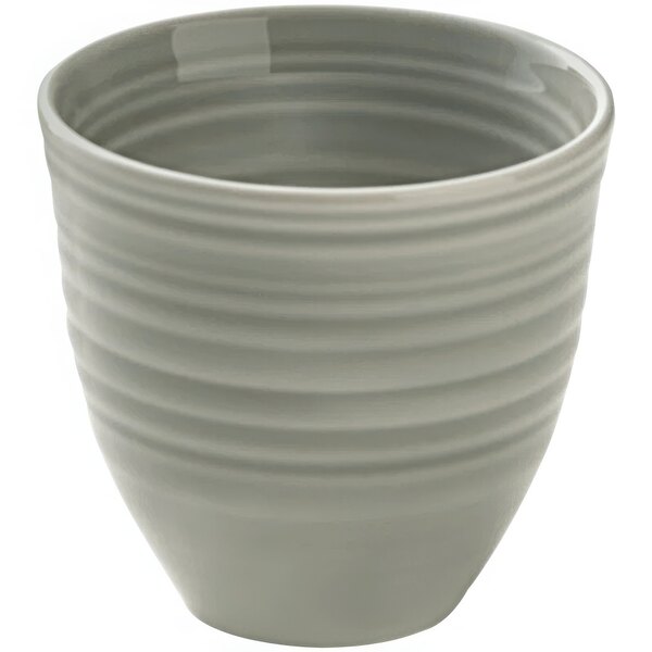 A white porcelain bowl with a curved pattern.