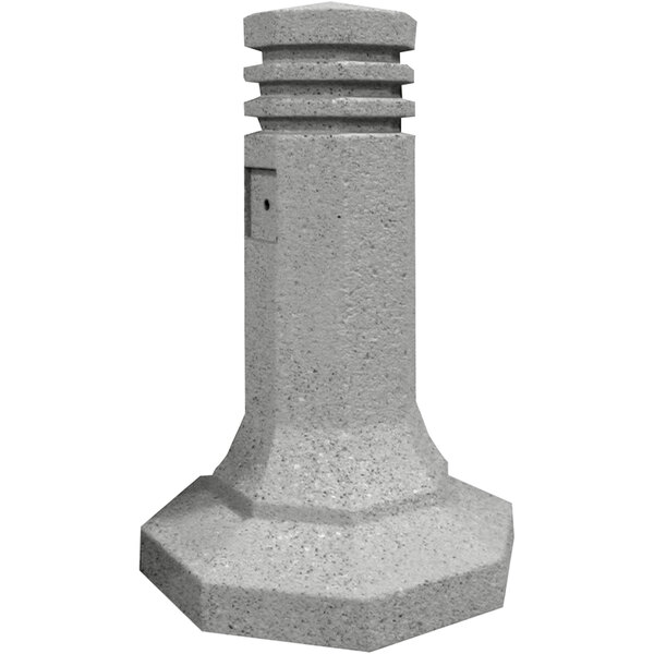 A Wausau Tile round concrete bollard with a hexagonal base.